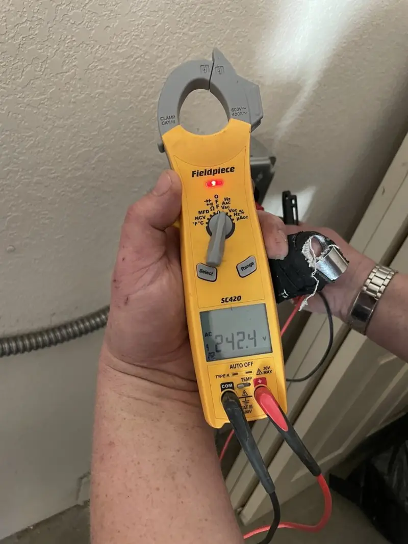 Voltage testing with clamp meter during Recessed Lighting Installation in Bremerton